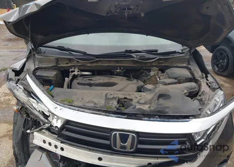 2021 Honda Odyssey Elite z USA, uszkodzony, nr VIN 5FNRL6H98MB010450